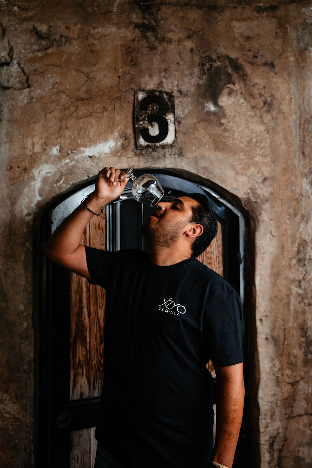 Yéyo Master Distiller and part owner Sergio Cruz tasting tequila at the distillery