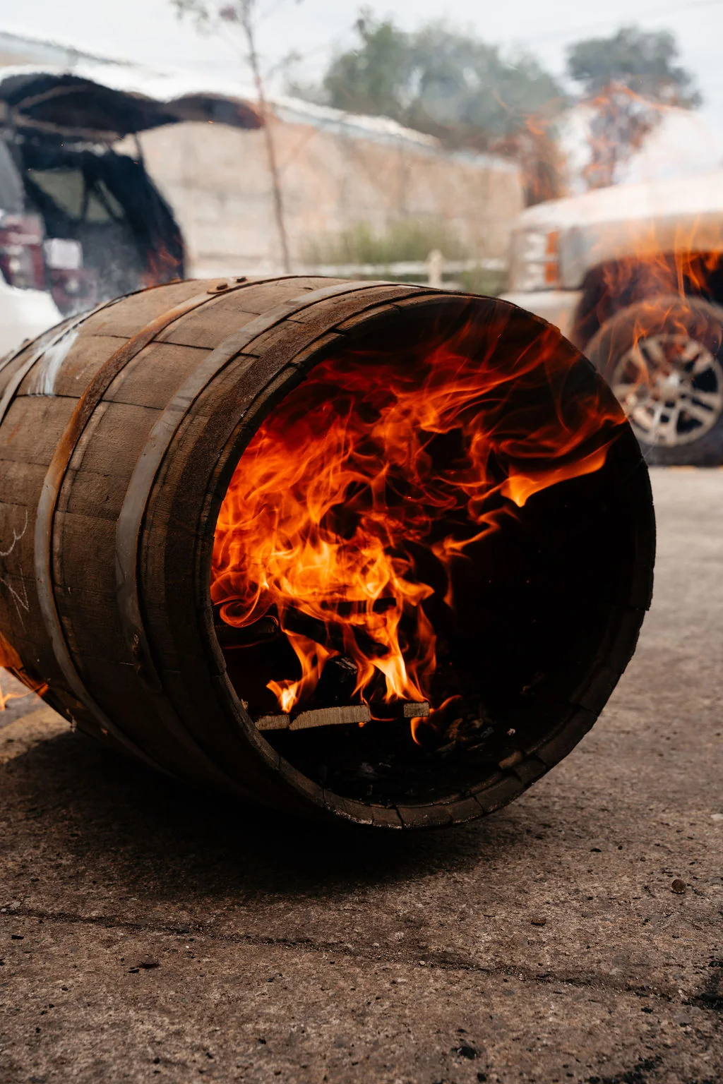 The interior of a wooden barrel burning during physical barrel preparation